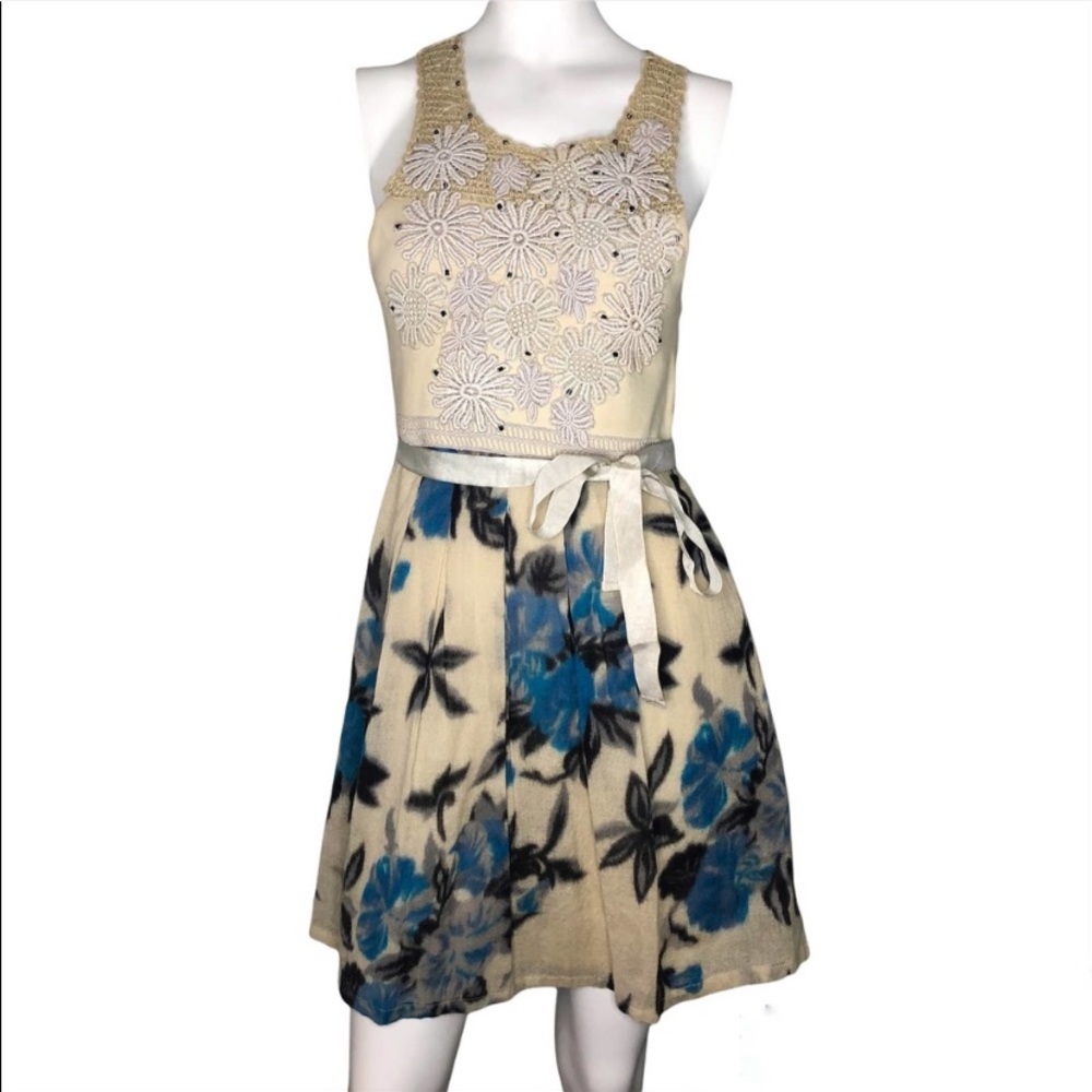 Free People sleeveless fit and flare dress with crocheted floral detail